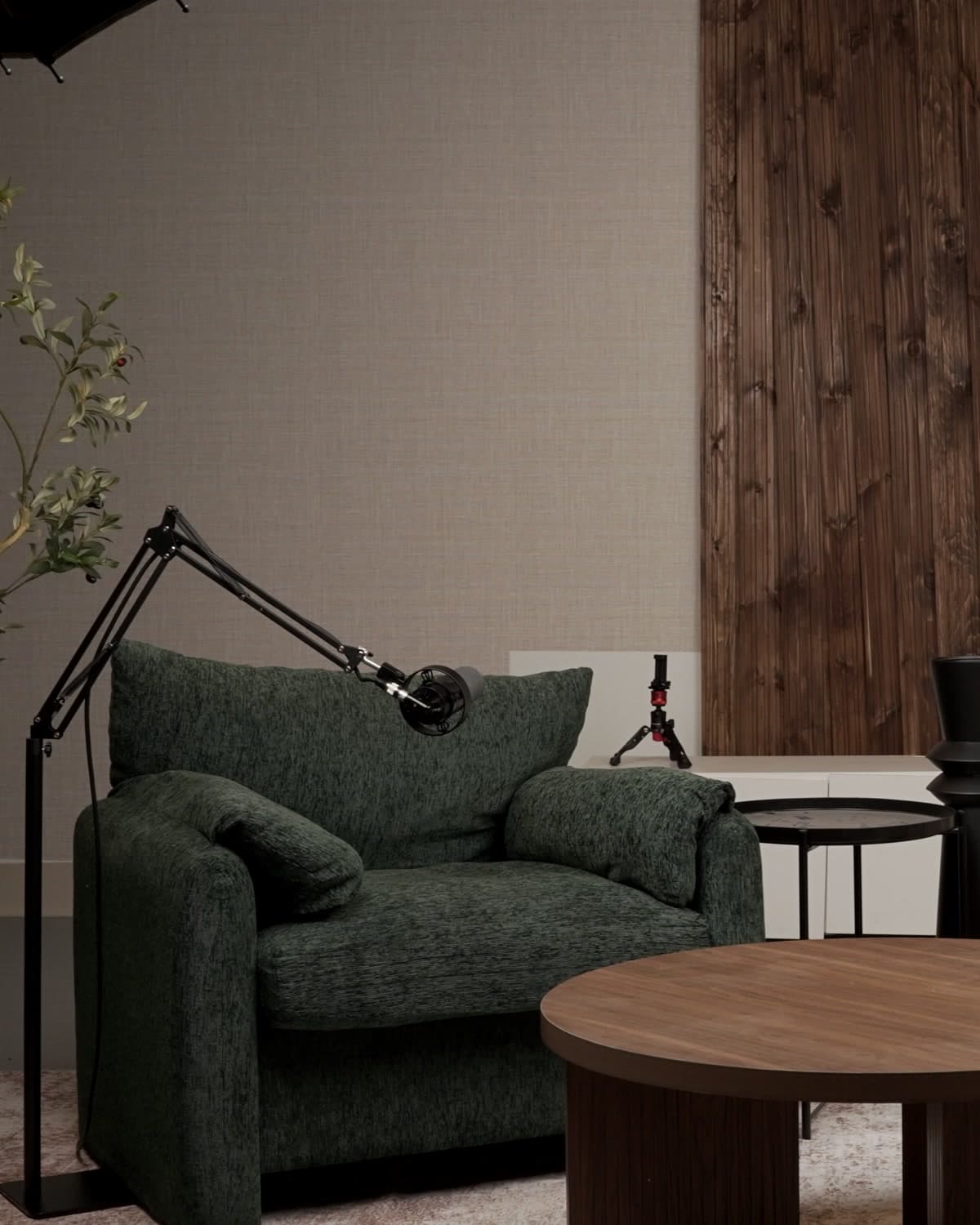 Production Studio — seating, lighting rig and set wall